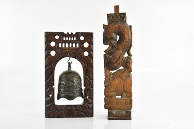 Lot 1550 - An Eastern carved strut decorated with...