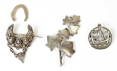 Lot 1085 - GEOFFREY G BELLAMY; a hallmarked silver brooch...