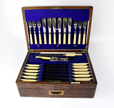 Lot 820 - An oak canteen containing ivorine-handled...