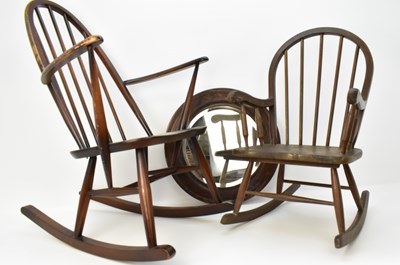 Lot 2 - A dark wood Ercol stick-back rocking chair, a...