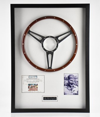 Lot 1475 - SIR STIRLING MOSS OBE; a signed framed display...