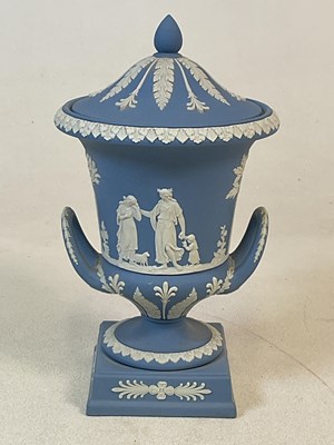 Lot 409 - WEDGWOOD; a blue jasperware Campagna urn...