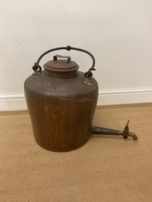 Lot 315 - A very large copper urn, with brass tap....