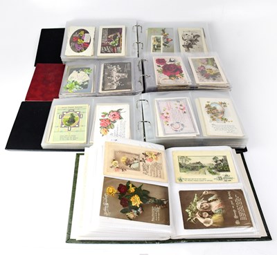 Lot 764 - Four postcard albums containing early/mid-20th...