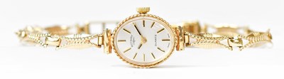 Lot 1156 - ROTARY; a 9ct gold cocktail watch, the dial...