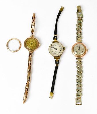Lot 1155 - Three 9ct gold cased ladies' wristwatches, all...