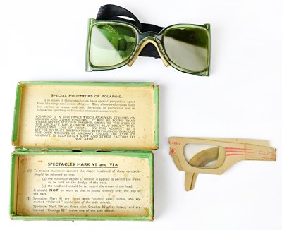 Lot 600 - A boxed pair of RAF Polaroid flying spectacles,...