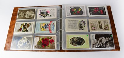 Lot 756 - A postcard album containing approximately 420...