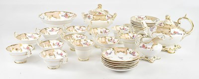 Lot 1765 - A 19th century Rockingham style part tea...