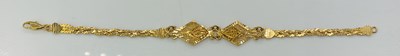 Lot 797 - A 21ct yellow gold Middle Eastern bracelet,...