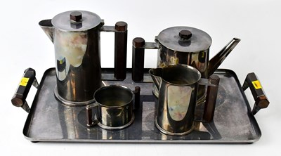 Lot 896 - An unusual five-piece silver-plated tea set...