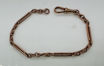 Lot 811 - A 9ct rose gold short chain, now working as a...