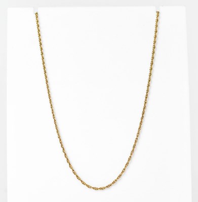 Lot 1101 - A 9ct gold fine double link chain, stamped...
