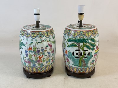 Lot 77 - A pair of Chinese porcelain barrel form table...