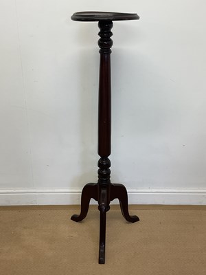 Lot 2863 - A mahogany torchere with turned support on a...