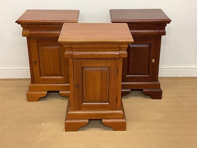 Lot 2806 - Three modern cherrywood bedside cabinets with...