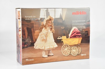 Lot 1576 - MARKLIN; girl with pram, 16111, 30cm, boxed.