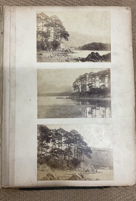 Lot 2095 - Two photograph albums comprising approximately...