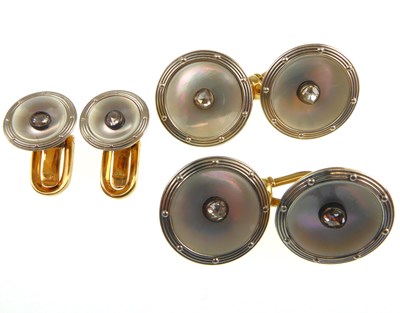 Lot 1204 - A pair of yellow Continental gold cufflinks...