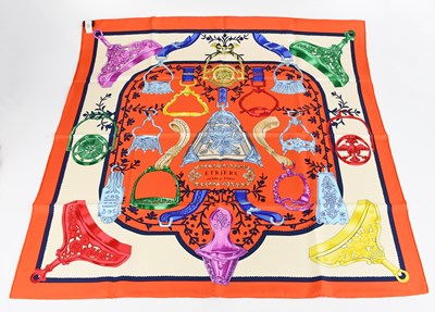 Lot 740 - HERMÈS; a 100% silk unused Etriers scarf...