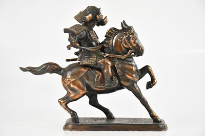 Lot 1716 - A copper figure of a samurai mounted on horse...