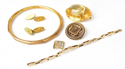 Lot 1132 - Various items of unmarked gold-coloured metal...