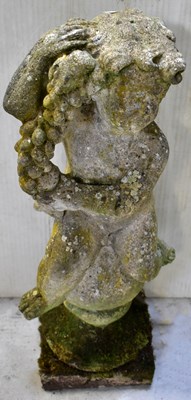 Lot 80 - A reconstituted stone garden statue of a...