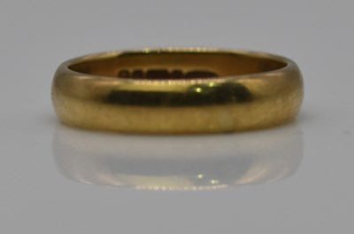 Lot 890 - A 9ct gold wedding band, size Q, approx 4.25g.