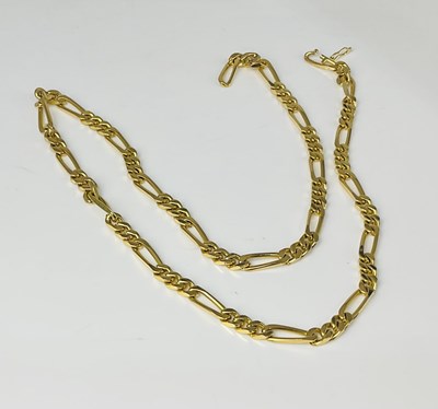 Lot 894 - A yellow metal figaro chain, indistinctly...