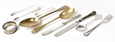Lot 947 - Nine items of hallmarked silver cutlery,...
