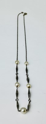 Lot 931 - A 9ct white gold and cultured pearl necklace,...