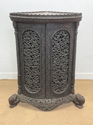Lot 2800 - A 19th century Indonesian hardwood bowfronted...
