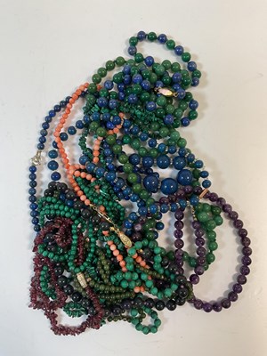 Lot 967 - A group of bead necklaces including malachite,...