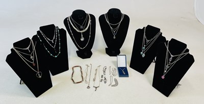 Lot 973 - A collection of silver and white metal...