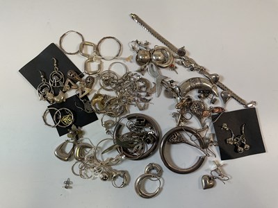 Lot 974 - A collection of silver and white metal...