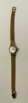 Lot 1113 - OMEGA; a lady's vintage 9ct gold wristwatch...
