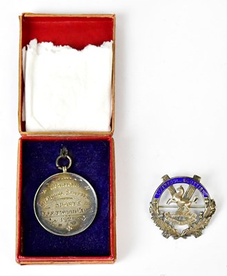 Lot 876 - A hallmarked silver military sporting medal...