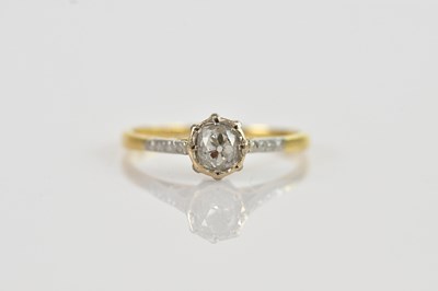 Lot 522 - An 18ct yellow gold diamond set solitaire ring,...