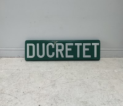 Lot 312 - DUCRETET; a plastic advertising sign, 163 x 45cm.