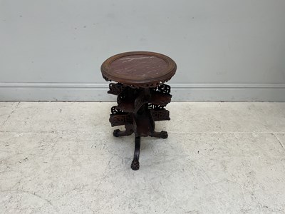 Lot 1537 - A 19th century Oriental hard wood marble top...