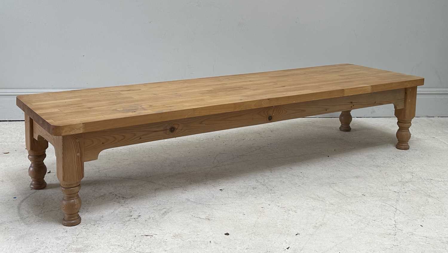 Lot 45 - A large modern pine rectangular coffee table...