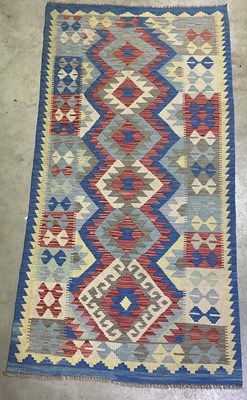 Lot 2742 - A hand stitched Iranian rug with distinctive...