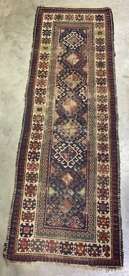 Lot 2741 - A hand woven Moroccan runner with an oblong...