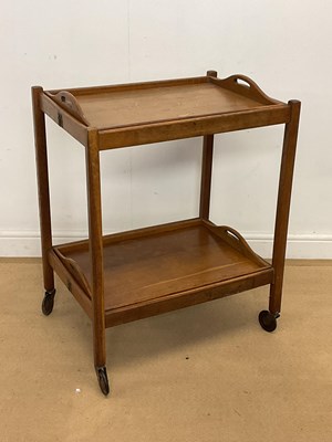 Lot 2870 - A two tier oak folding trolley on castors,...