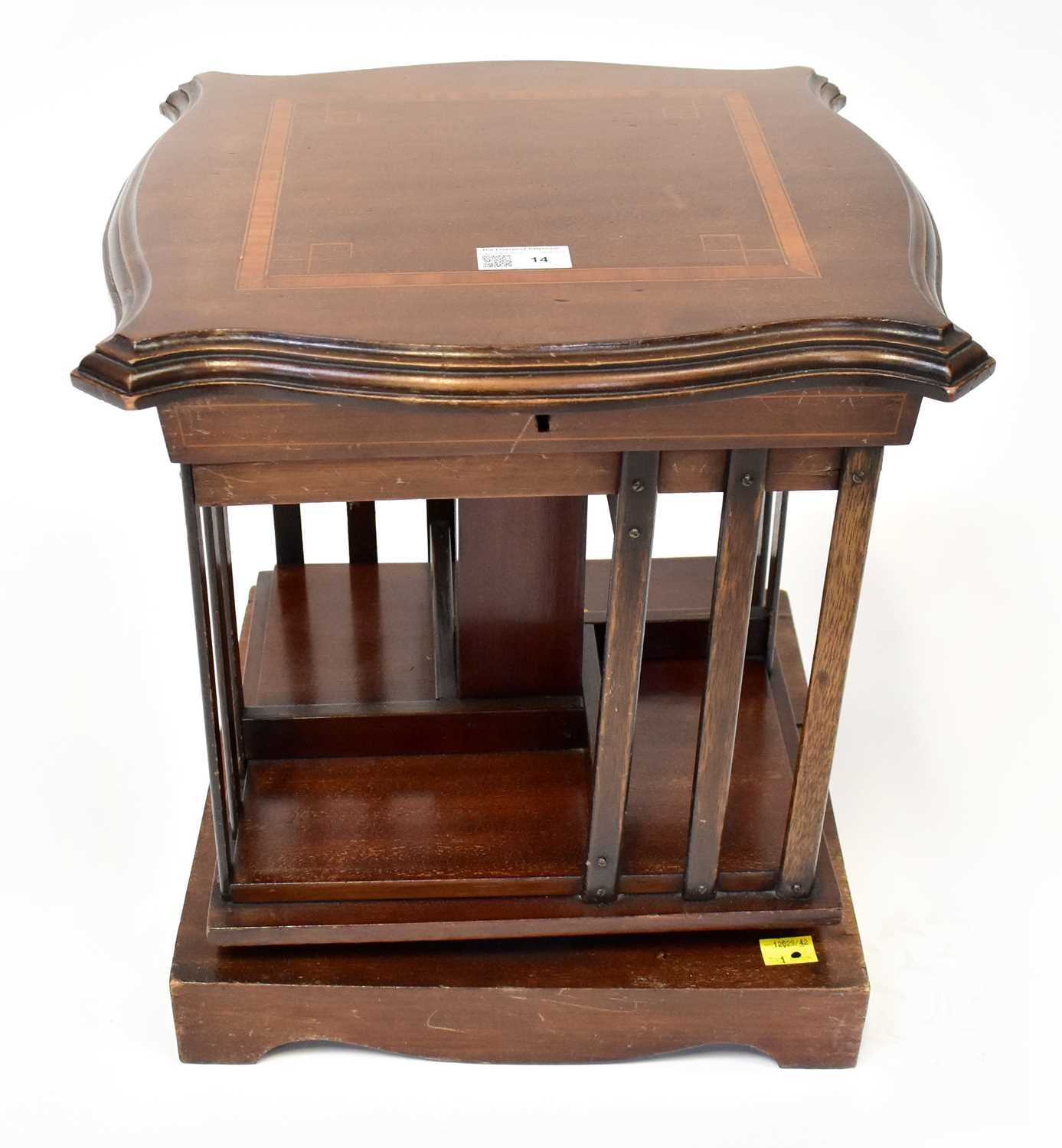 Lot 14 - An Edwardian mahogany tabletop revolving...