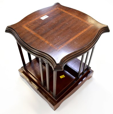 Lot 14 - An Edwardian mahogany tabletop revolving...