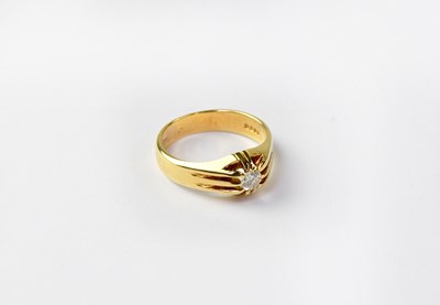 Lot 1001 - An 18ct gold solitaire diamond ring in...