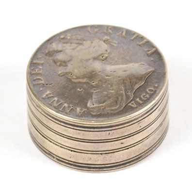 Lot 2237 - A white metal circular lidded box formed of a...