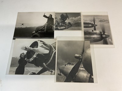 Lot 2037 - Five black and white photographs with an...