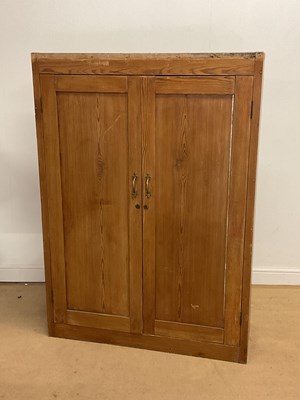 Lot 2867 - A pine two door cupboard, height 144cm, width...